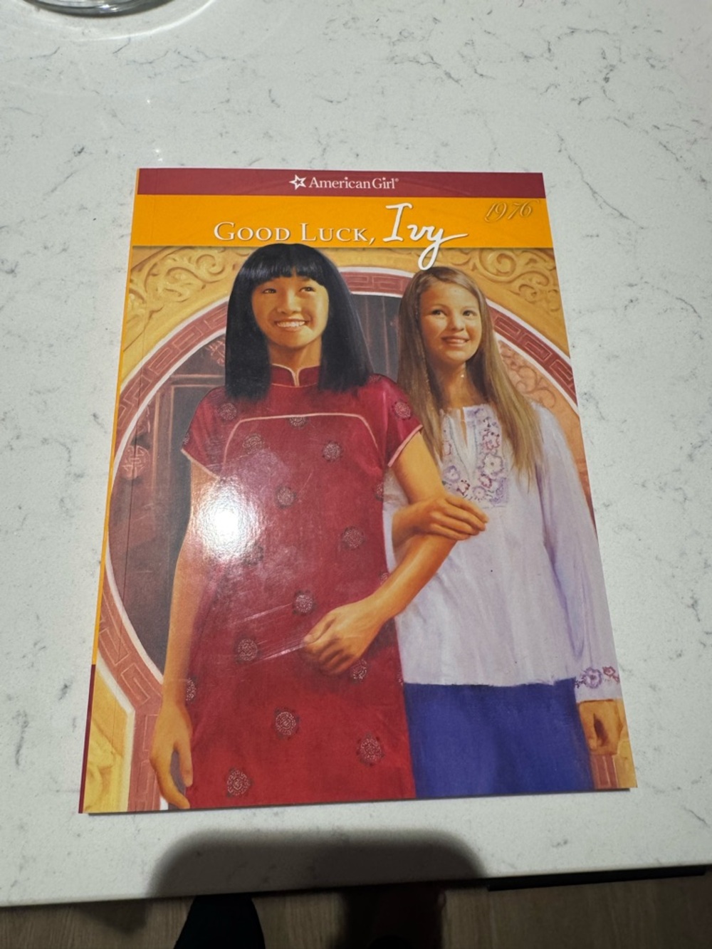 American Girl Book - Red, Yellow, Purple Cover Featuring Two Girls